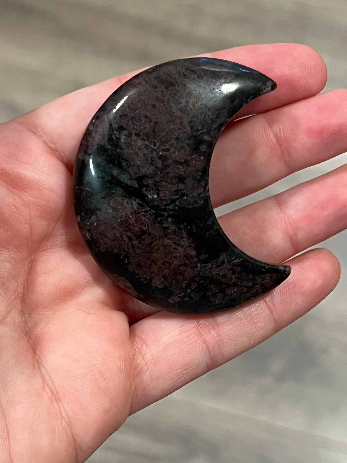 Garnet and Arfvedsonite Crescent Moon Carving
